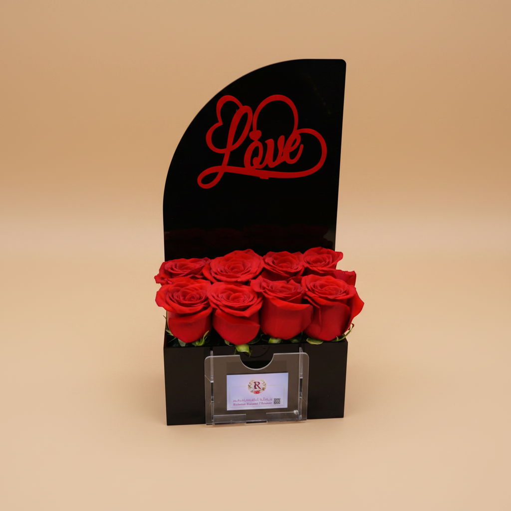 Black holder with red roses and 'Love' text on a white background