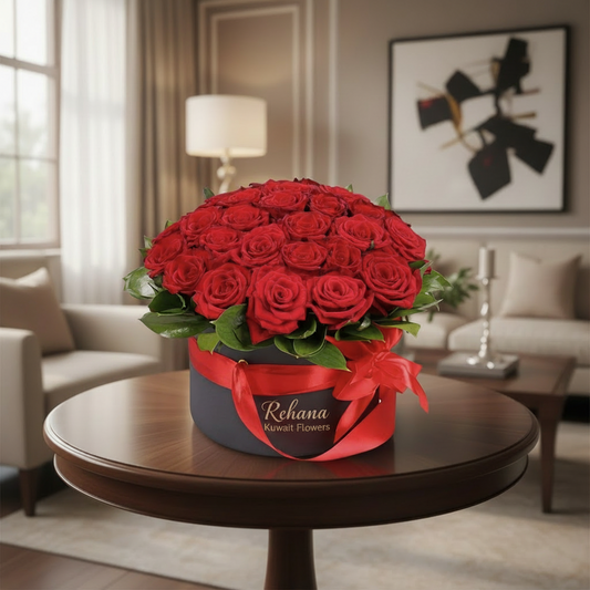 Bouquet of red roses in a black box with a red ribbon on a white background